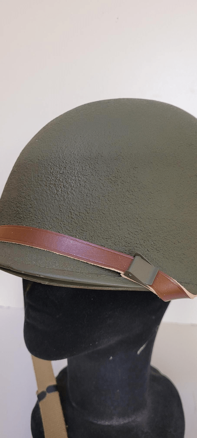 Schleuter original texturing front seam swivel bail with liner by Seaman Paper Company.