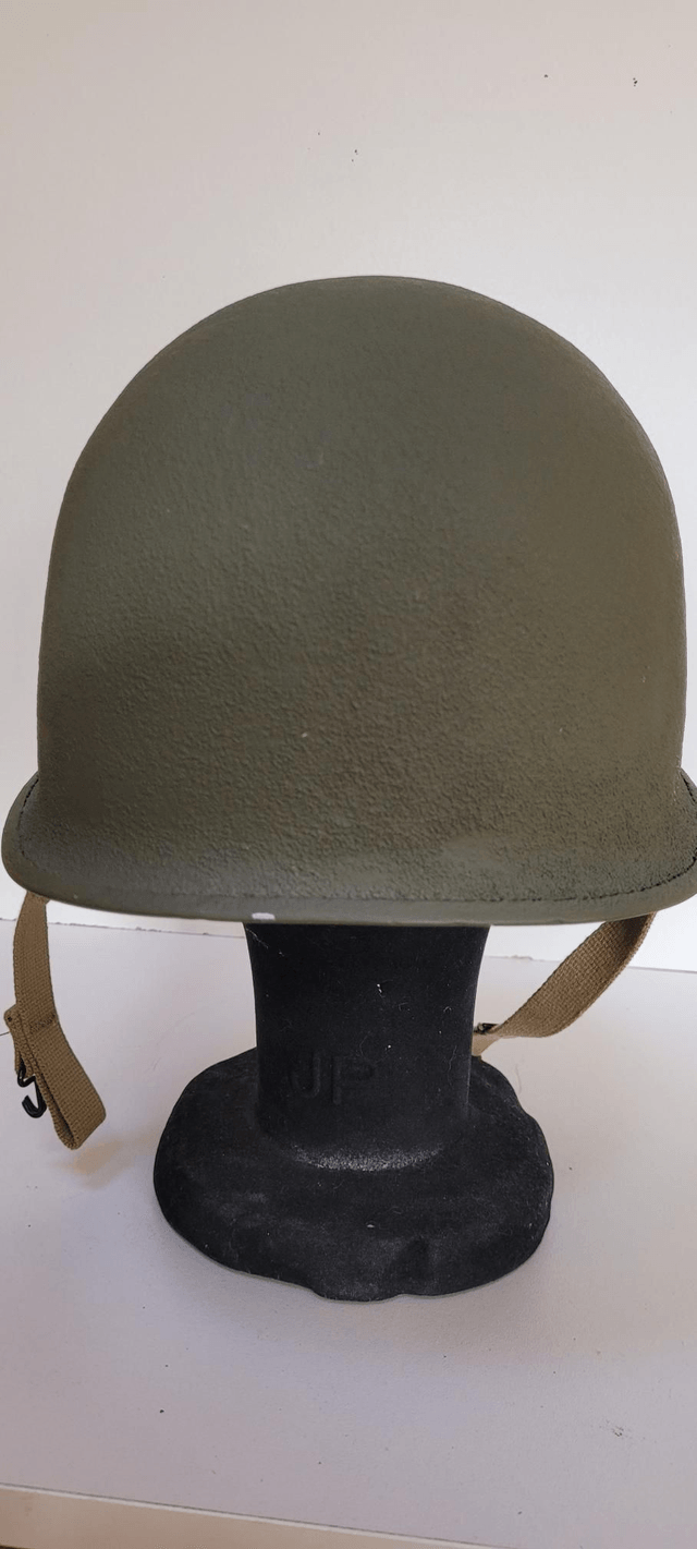 Schleuter original texturing front seam swivel bail with liner by Seaman Paper Company.